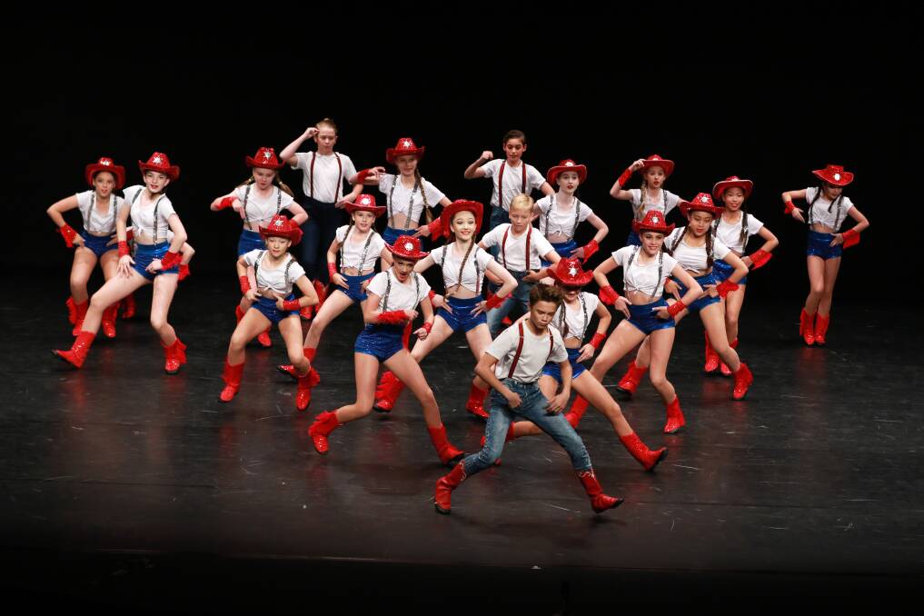 Entertaining: Newcastle Dance Academy took out Section 714 Open – Jazz Dance Groups 12 years and under with this routine. Photo: Scott Calvin/Carl Muxlow.