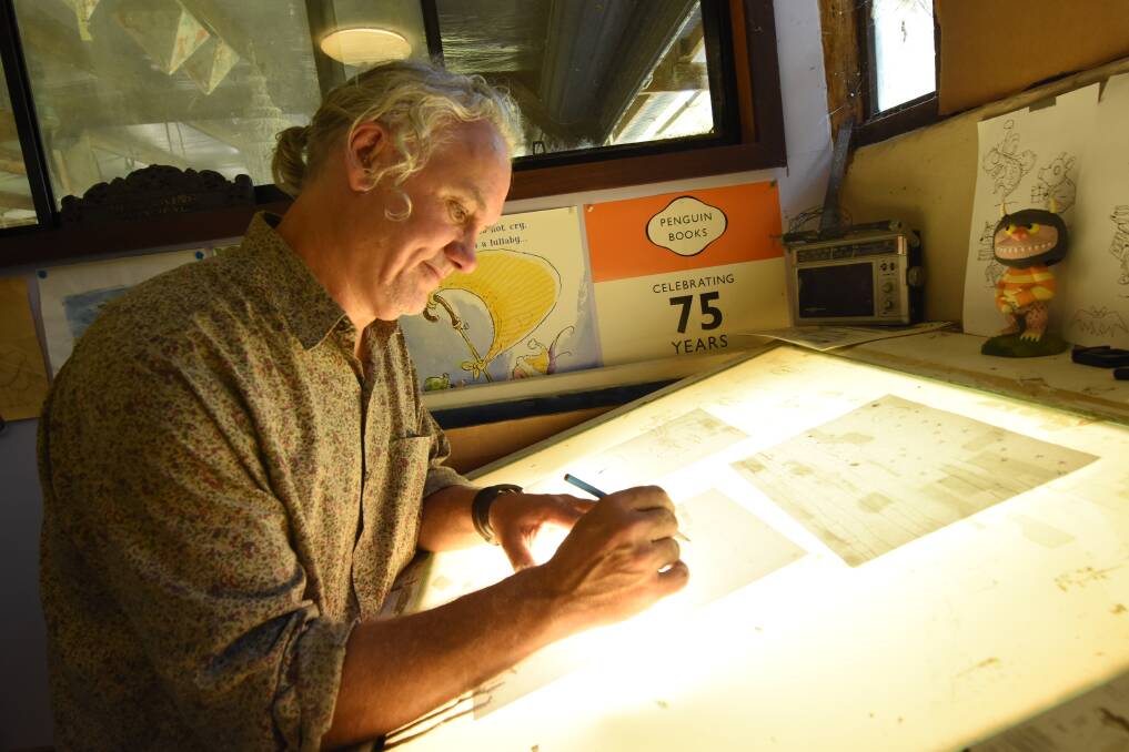 Illustration: Stephen Michael King works at his light box.