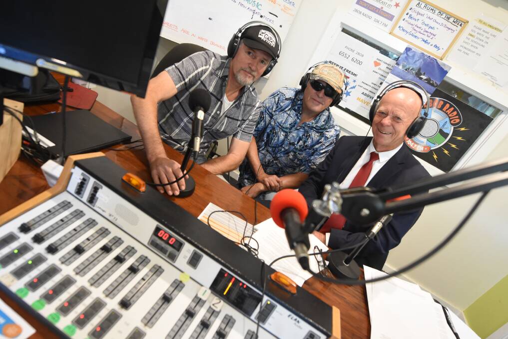 Cam Jennings and John Griggs chat with MidCoast Council mayor David West in the 2BOB studio. Photo: Scott Calvin.