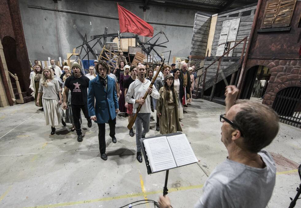 One Day More: The Les Miserables cast in rehearsal with musical and vocal director Don Secomb. Photo: Ashley Cleaver/Cleavers Images.
