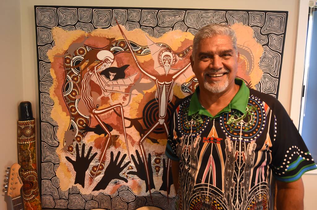 Meaning behind work: This painting of Russell's is about culture, the land and spiritual significance. Photos: Scott Calvin.