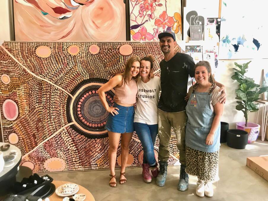 Overwhelming response: Artist Melissa Greenwood, Deb and Andy Saunders and The Block Shop Pop Up store manager Harrie Colella with the work created by Melissa and her mum, Lauren Jarrett. Photo: Supplied.
