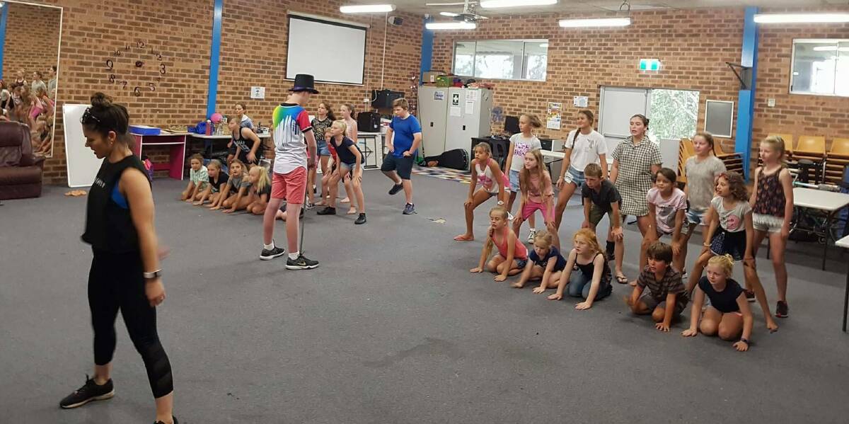 Preparation: Young singers and dancers rehearse for the showcase, led by Stacey Evans of Stacey Lee Entertainment. Photo: Supplied.