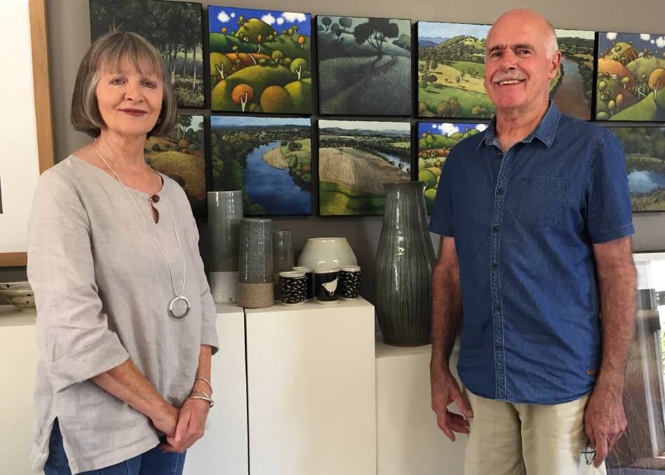 Paintings and ceramics: Yvette and Peter Hugill with some of the works that will be on exhibition at Gloucester. Photo: Julia Driscoll.