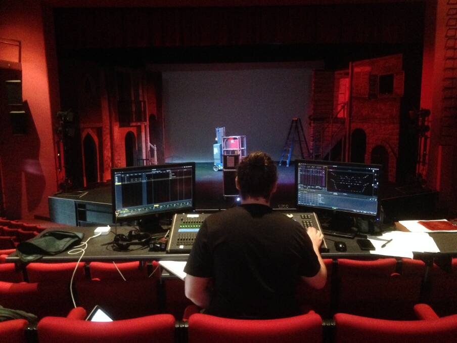 Preparations underway: Manning Entertainment Centre technician Nathaniel Tanare works on the lighting design for Taree Arts Council's Les Misérables.