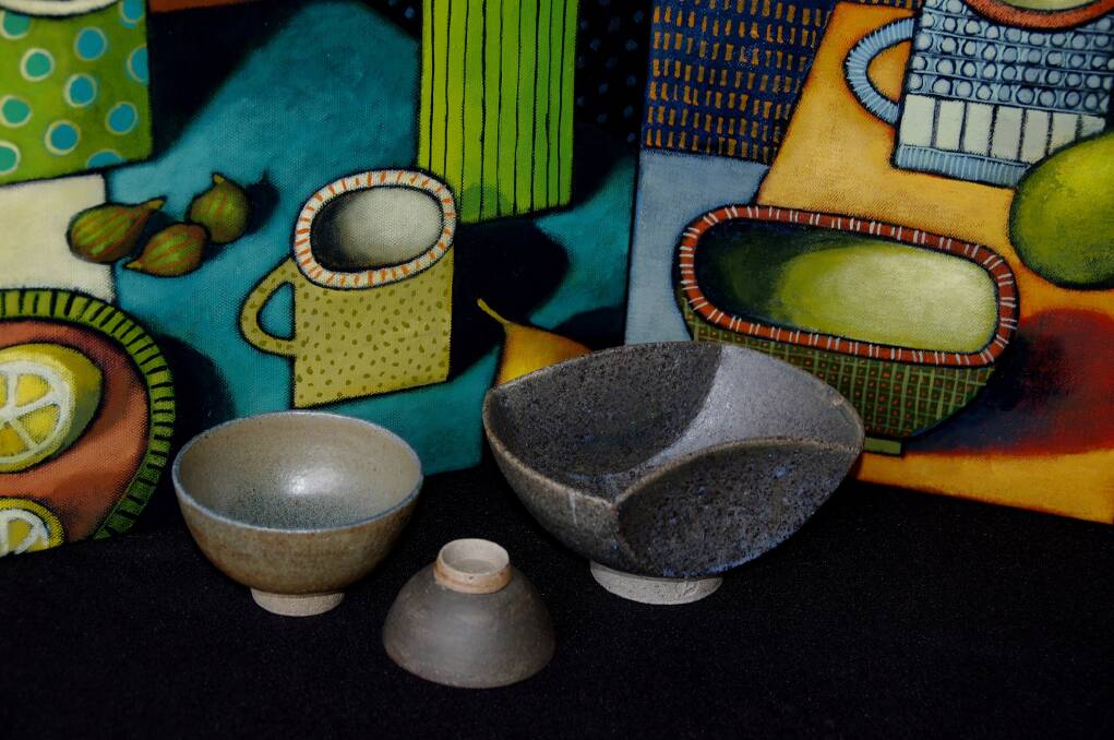 Collaboration: Yvette and Peter Hugill are combining their skills into an exhibition. Pictured are Yvette's artworks, Things Quirky VI and Things Quirky X 2018, and Peter's  various stoneware bowls.