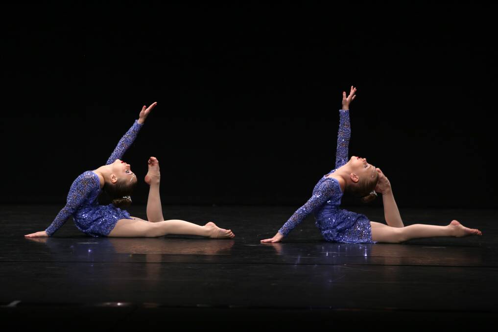 On stage: Duo Avalon Huebner and Coco Huebner from Forster Tuncurry were the winners of Section 530 District – Dance Duo/Trio 10 years and under. Photo: Scott Calvin/Carl Muxlow.