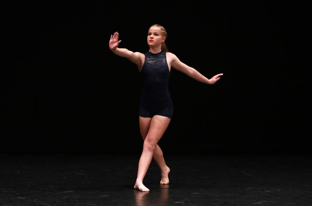 On stage: Amelia Searles from Taree received first place in Section 425b Novice – Contemporary Solo 12 years and under. Photo: Scott Calvin/Carl Muxlow.