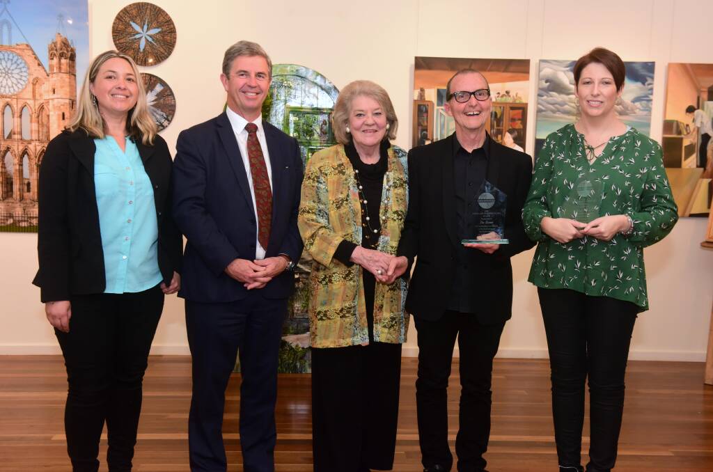 Awarded: MidCoast Council deputy mayor Katheryn Smith, member for Lyne Dr David Gillespie and Manning Winter Festival president Mave Richardson with joint winners of the Performing Arts Award, Don Secomb and Tanya Brown. Photo: Julie Slavin.