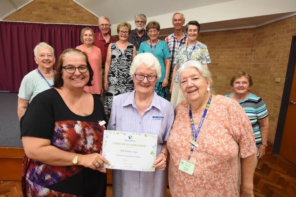 Support: Taree Women’s Refuge manager Suzi Rowe accepts a cheque from Silver Tones leader Pam Archer OAM, Manning Valley U3A president Lina Ingram and other members.