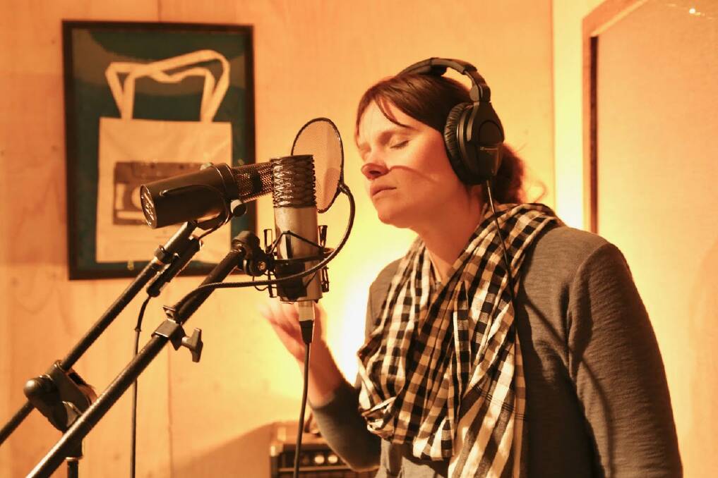 Singer Anna Weatherup lays down the vocal track.