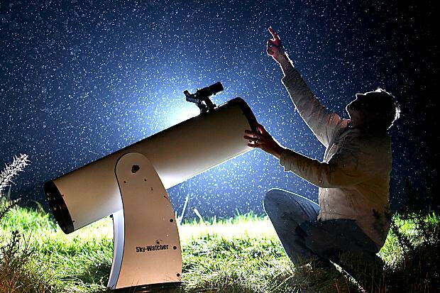 Look up: Light pollution is killing astronomy. Photo: Mike Wade Scottish News.
