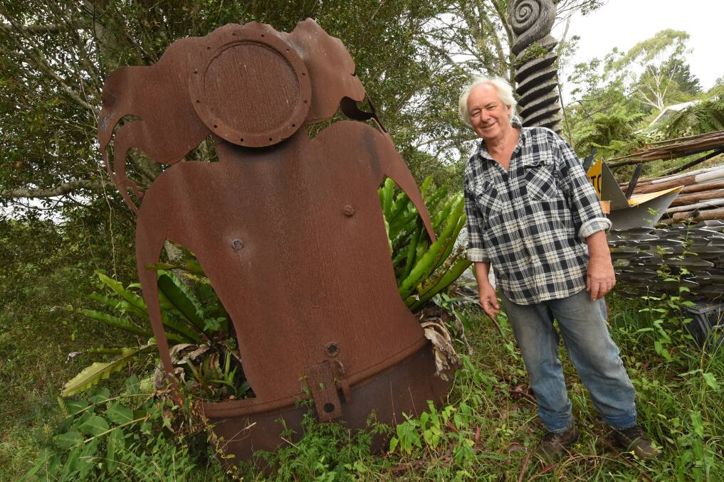 Outside: Rick Reynolds with one of the steel sculptures that can be found on his Elands property.