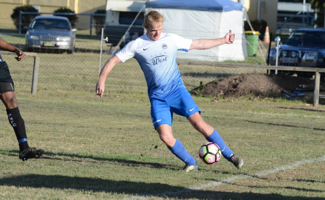 Taree's Lawrence Maurer controls the ball in the recent clash against Port Saints. The Wildcats play Kempsey Saints on Saturday at Kempsey.