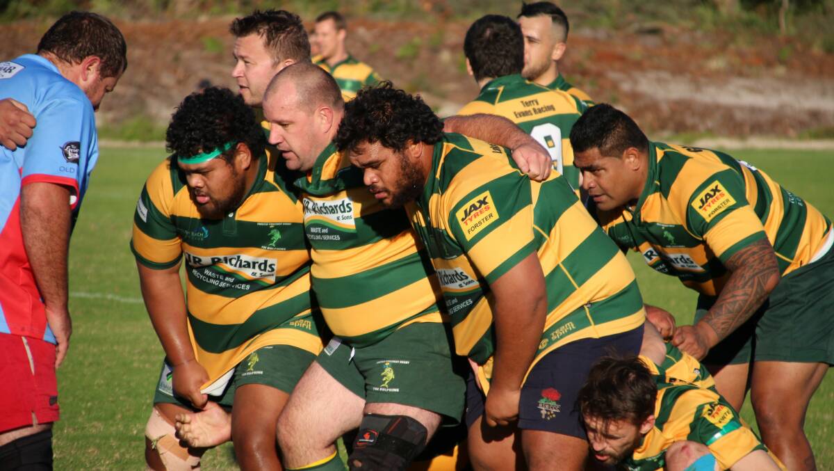 Forster-Tuncurry's front row trio of tight-head Austin Latu, hooker Gavin Maberly-Smith and loose-head Ringo Latu, and at rear, man of the match, second-rower Hau Honemau. Photo Sue Hobbs. 