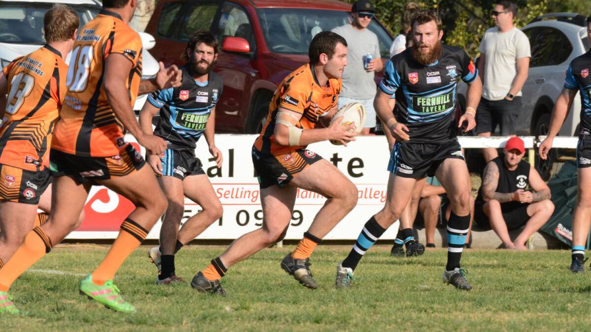 Hard working Wingham front rower Blake Fraser take the ball to the Port Macquarie defence during the second round clash at Wingham. The same teams meet on Saturday in the minor semi-final, also at Wingham.