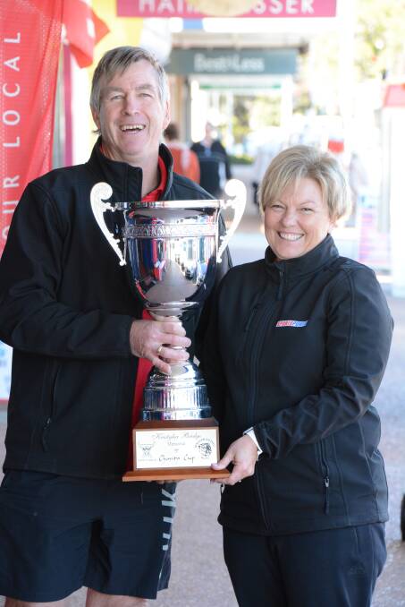 Gary and Tanya Bridge with the Kristylea Bridge Cup to be contested by Taree City and Wingham first grade sides this week.