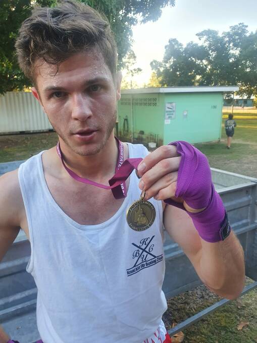Ca'Naan O'Donnell with his gold medal after winning the Sunstate Golden Gloves light heavyweight division in Cairns.