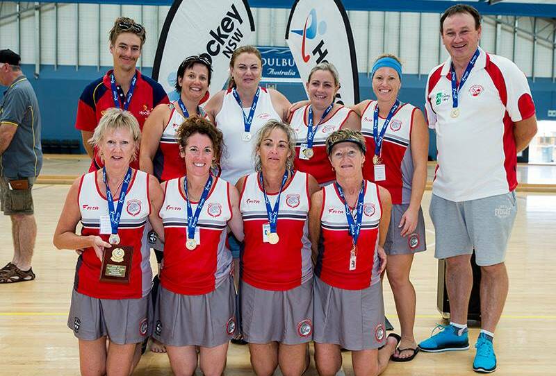 We are the champions: Manning's winning team at the NSW Masters Indoor Hockey championships (back from left) Ben Ferguson (coach), Lea Davy, Sandra Tran, Paula Smith, Kerrie Davy, Craig Colvin (manager). Front: Lyn Hinton, Melissa Mendham, Linda Ferguson and Katrina Hayes.