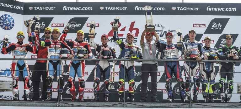 Riders on the podium after the Le Mans 24 hour race in France.