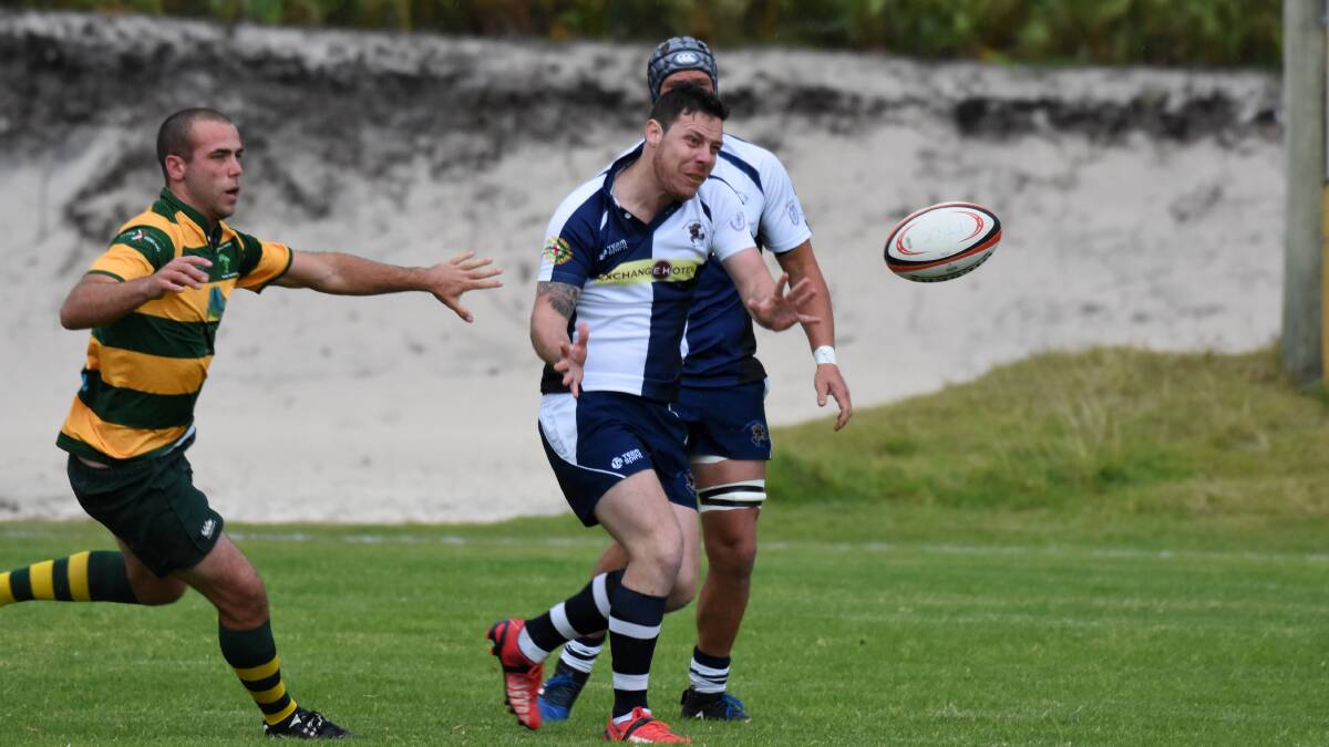 Manning Ratz utility player Mitch Carter gets a pass away during the recent clash against Forster-Tuncurry. The Ratz meet Wallamba at Nabiac on Saturday.