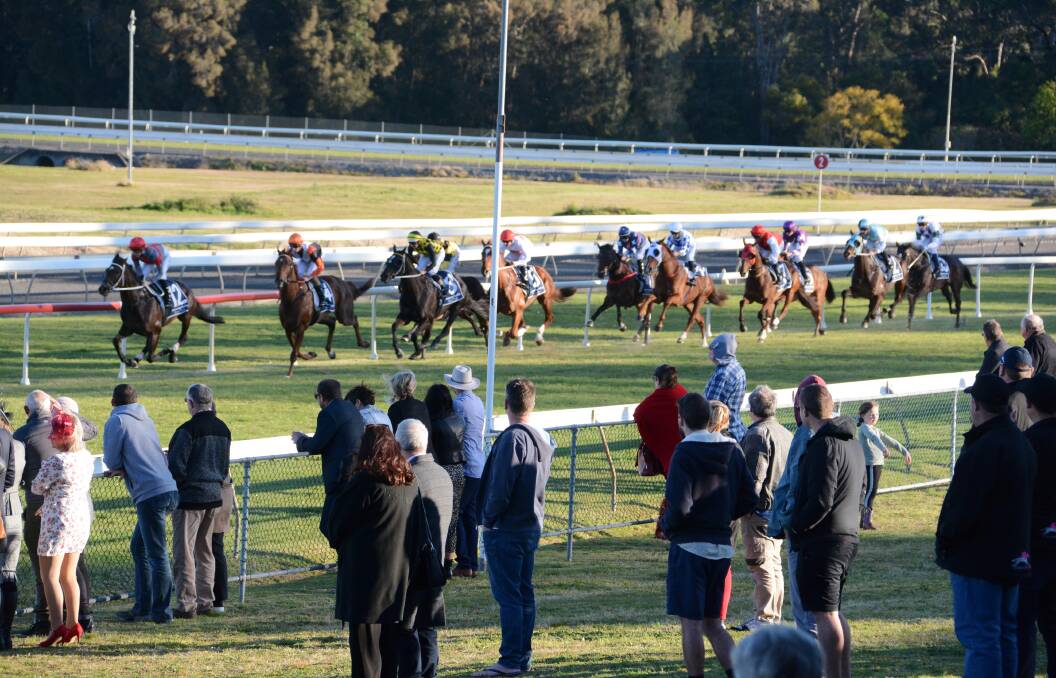 Rugged up patrons watch last year's Taree Cup run in August. The 2021 event will be held on Sunday November 21.