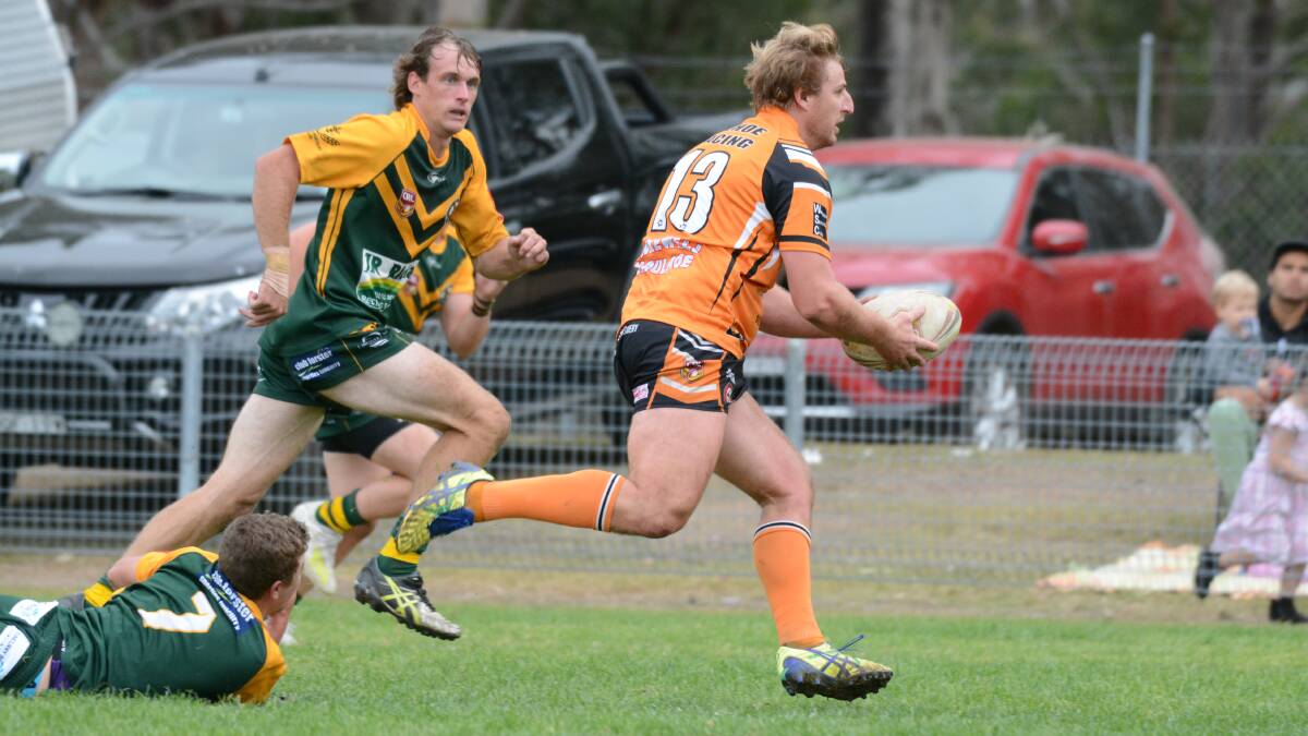 Wingham lock Brendan Butler races through a gap in the Forster-Tuncurry defence to score in the match at Wingham on June 1. The Tigers host Wauchope on Saturday.