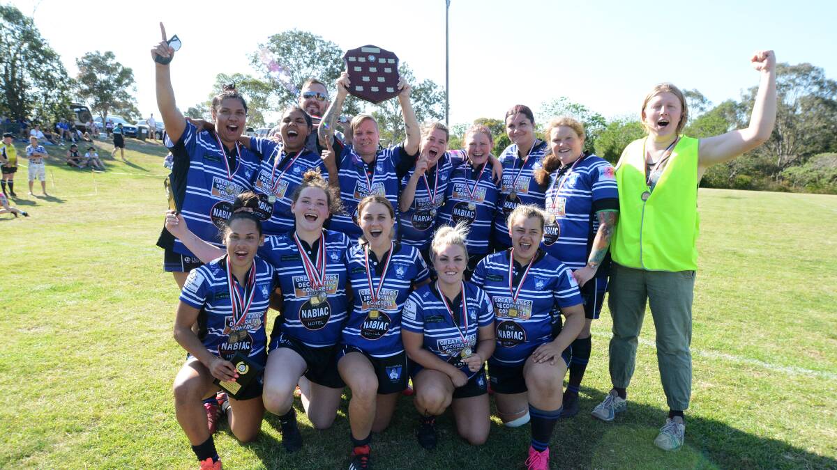 Wallamba players celebrate after winning the Lower North Coast women's 10s rugby premiership last season.