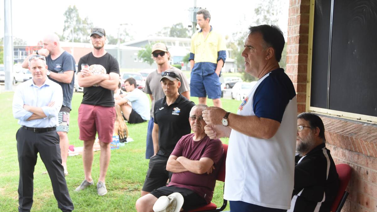 Newcastle Jets chief executive Laurie McKinna speaks to NPL players and their parents during a coaching session at the Zone Field at Taree.