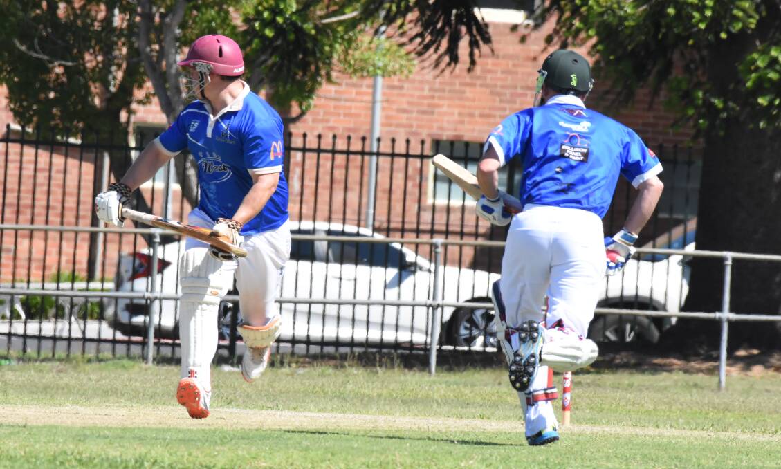 Taree West batsman Nathan Johnson and Brian Levi cross for a single during the clash against Wauchope. The West play Nulla at Kempsey on Saturday.