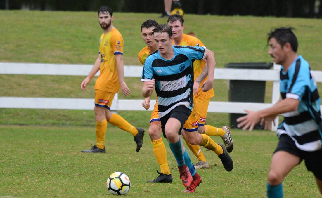 Taree's Kyle Brady goes on the attack in the Coastal Premier League game against Macleay Valley at the Taree Zone Field. Macleay won 3-0.
