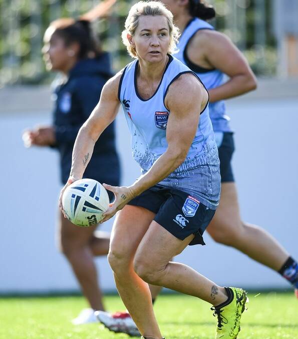 Country Rugby League's women's participation officer Kylie Hilder assures women's rugby league is no threat to the popular league tag competition.
