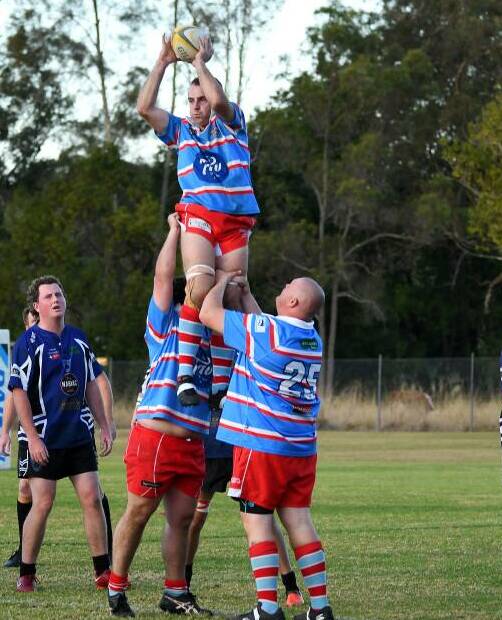 Jarod Lawrence goes high to secure a lineout win for Old Bar in a clash against Wallamba last season.