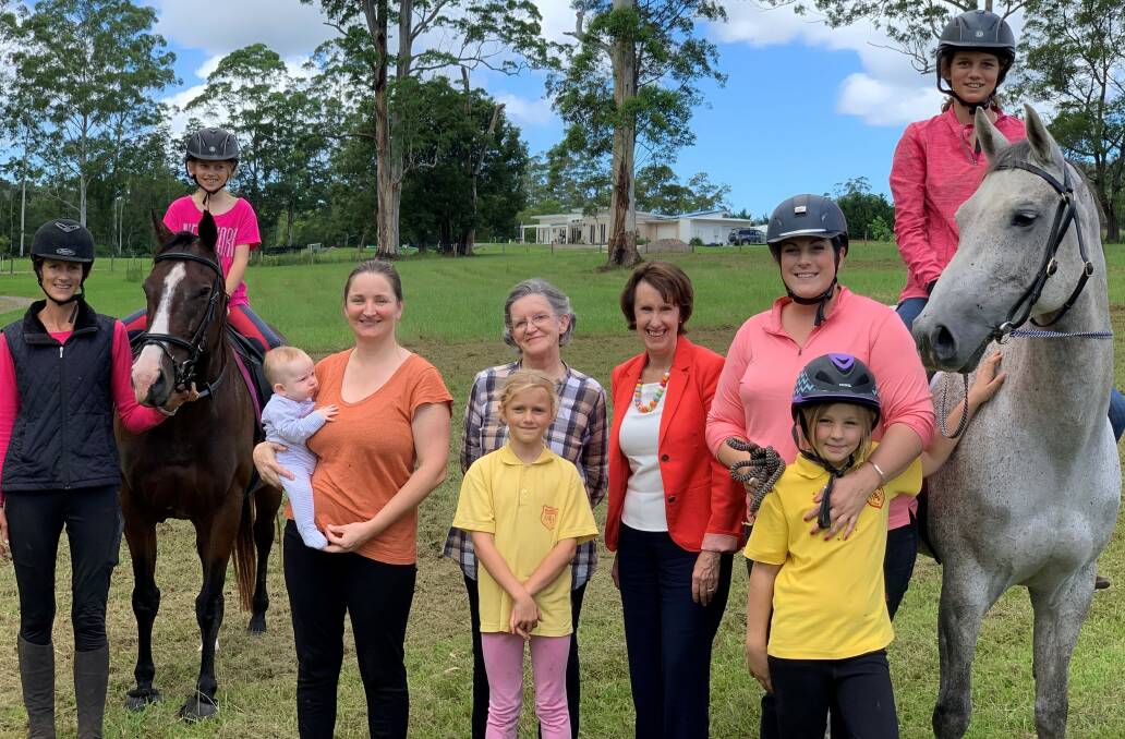 Member for Port Macquarie Leslie Williams with members of the Three Mountains Equestrian Club based at Hannam Vale.