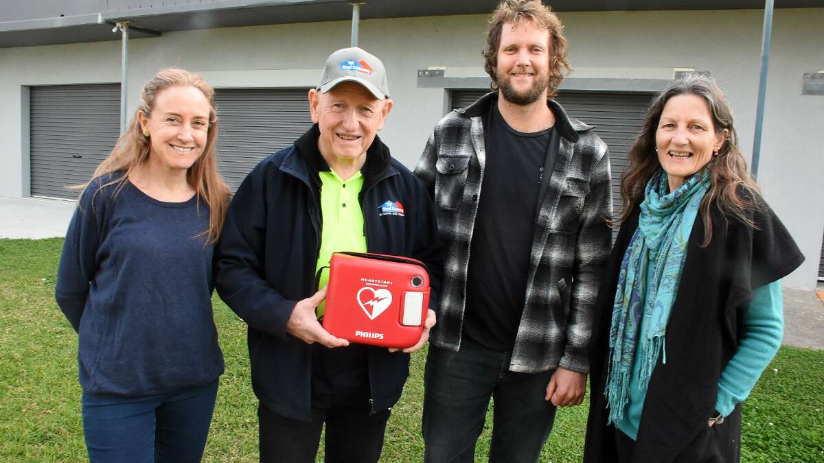 Lifesavers: Tny Frost (second from left) with Arna McDermott, Jacob Cook, and Pauly Maclean. They were among a group who came to his aid when he had a heart attack on february 1. 