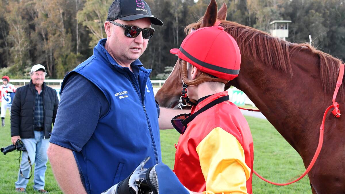 Trainer Glen Milligan speaks to jockey Zac Wadick after Just Molly won the Wingham Cup last June. That's Molly will be a starter in the MNC Country Championship qualifer at Tuncurry on Saturday.