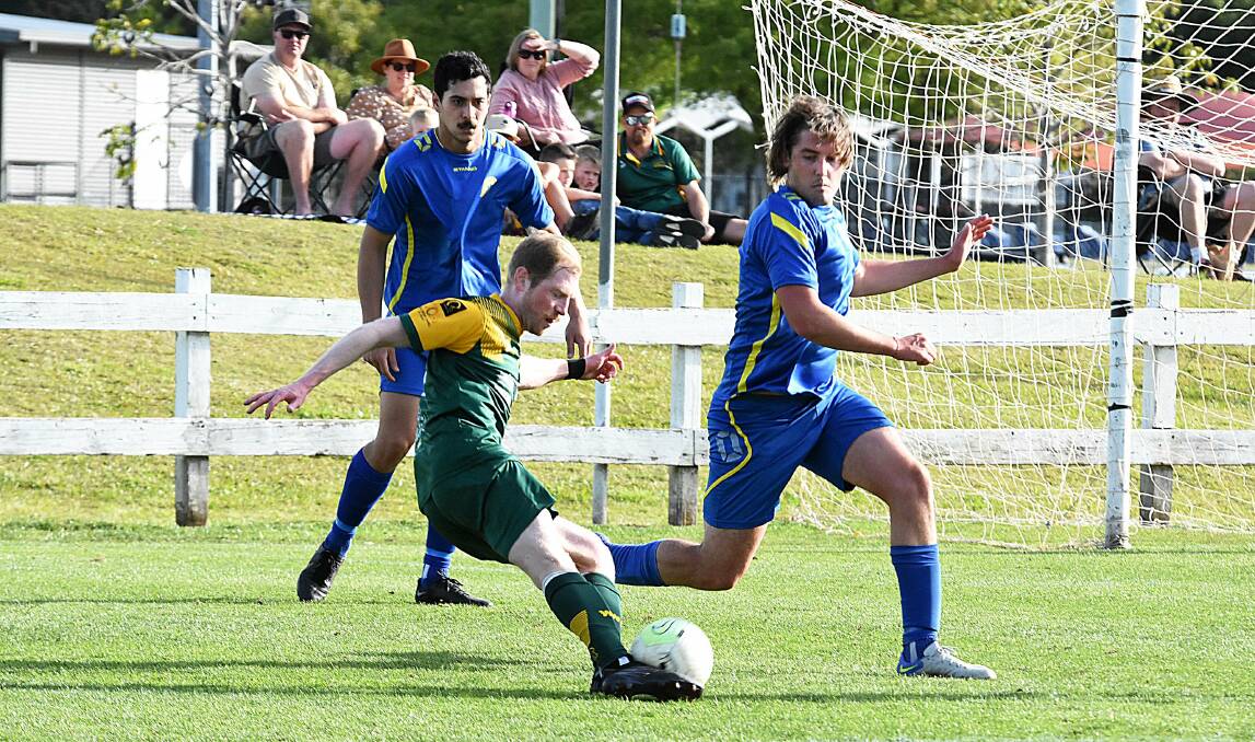 Jordan Howard from Wingham attacking in the Southern League grand final against Pacific Palms. Wingham won the game. The Warriors would be a perfect fit for the proposed Zone Premier League according to zone chairman, Lance Fletcher