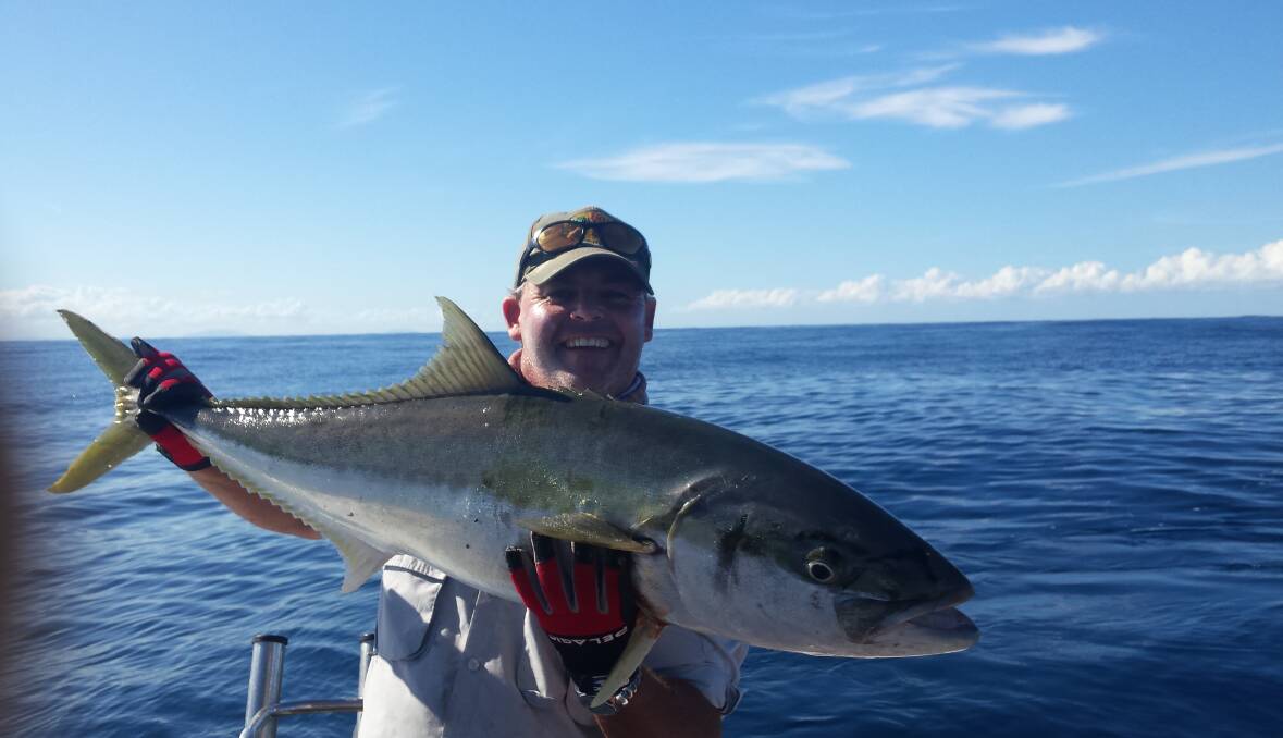 Paul Johnston with one of the kingfish he caught as part of his haul in the AAA bluewater championship.