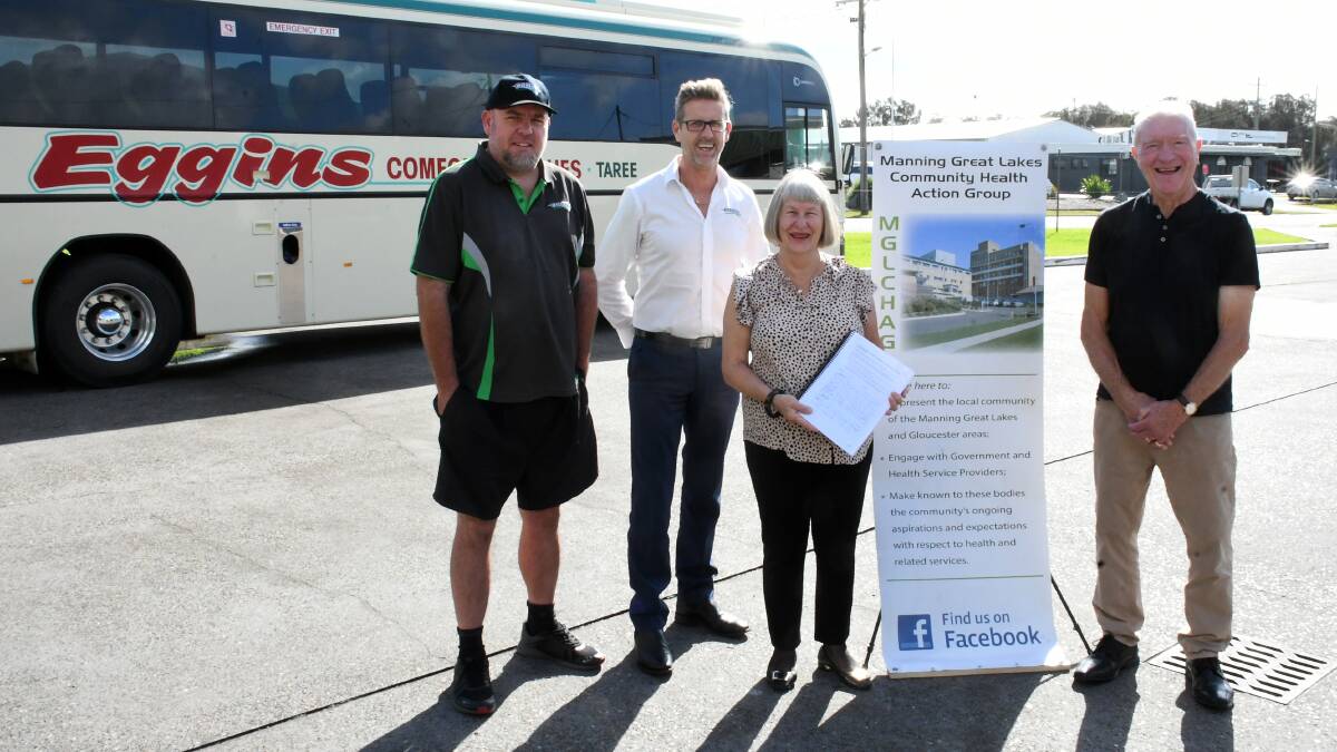 Eggins Comfort Coaches driver,James Cosgrove, Eggins Comfort Coaches manager Richard Eggins with Trish and Eddie Wood from the Manning Great Lakes Community Health Action Group.