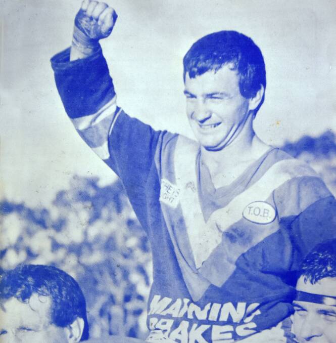 Glory days: Captain-coach Tony Hinton is chaired off the field following Taree Old Bar's win over Camden Haven in the 1988 Group Three grand final - the club's last premiership.