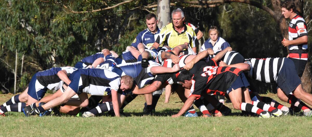 Manning Ratz and Gloucester forwards pack down for a scrum in the opening round of the Lower Mid North Coast competition at Taree. The Ratz play Old Bar on Saturday while Gloucester will be at home to Wallamba.