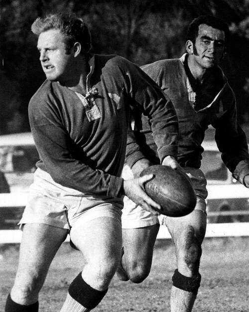 Tony Paskins about to offload during a match in the 1970 season. He retired after the Hawks won the grand final that year.