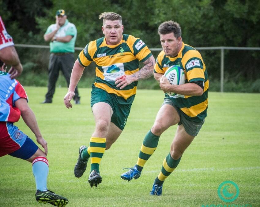 Tom Homer in action for the Forster Tuncurry Dolphins before his change to the Wallamba Bulls this season with Troy Haines in support. Photo Sue Hobbs.