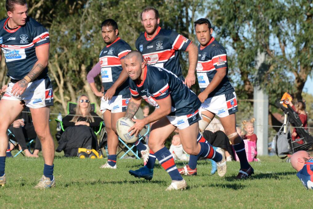 Old Bar captain-coach Mick Henry on the move in the game against Wauchope.