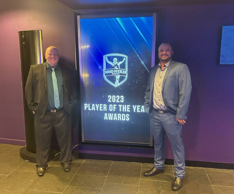 NSW Rugby League volunteer of the year Chris Hollis and NSW Rugby League's Ben Stewart at the award function in Sydney.