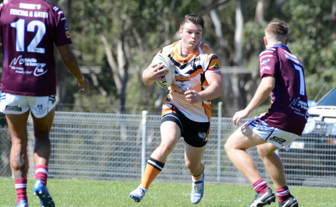 Wingham second rower Will Gee takes the ball to the Macksville defence during last weekend's under 18 fixture.