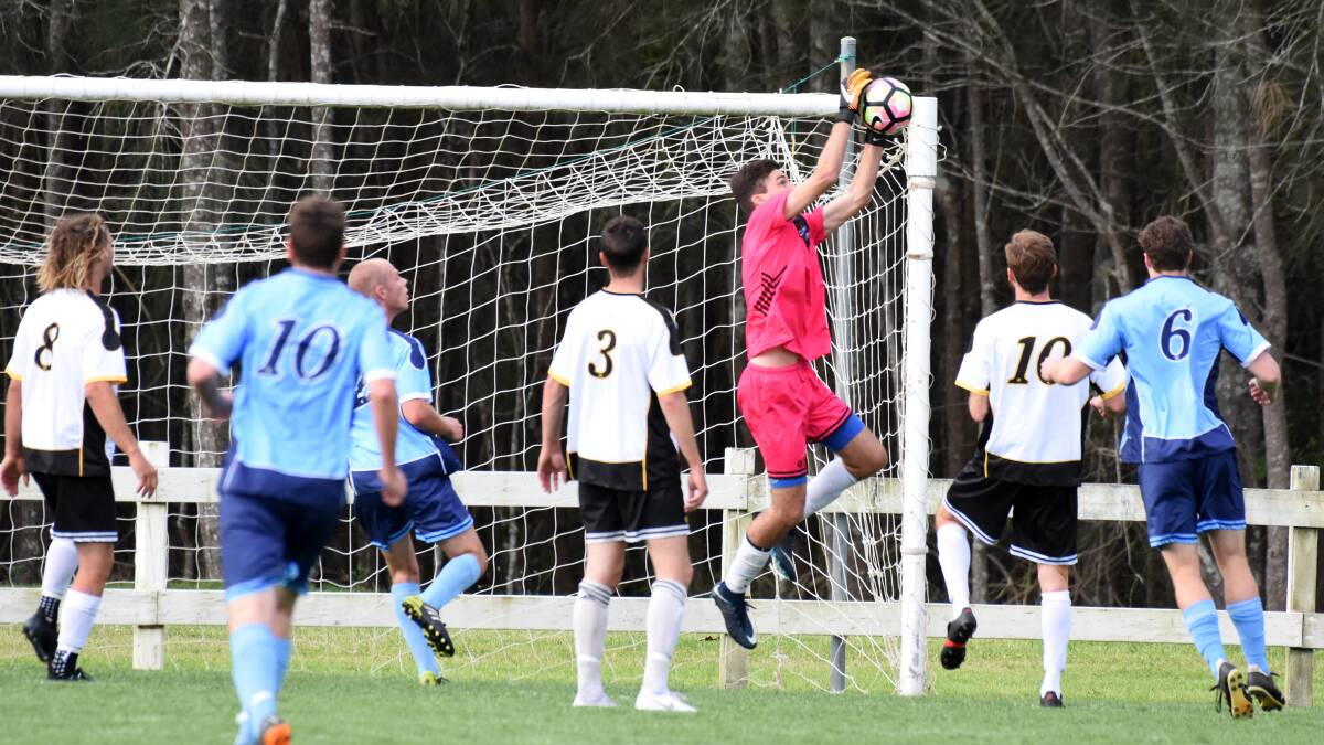 Taree keeper Curtis Jones goes high for a save during the representative North/South clash lat season. After an injury plagued 2018 Jones is fit to start this year's premier league.