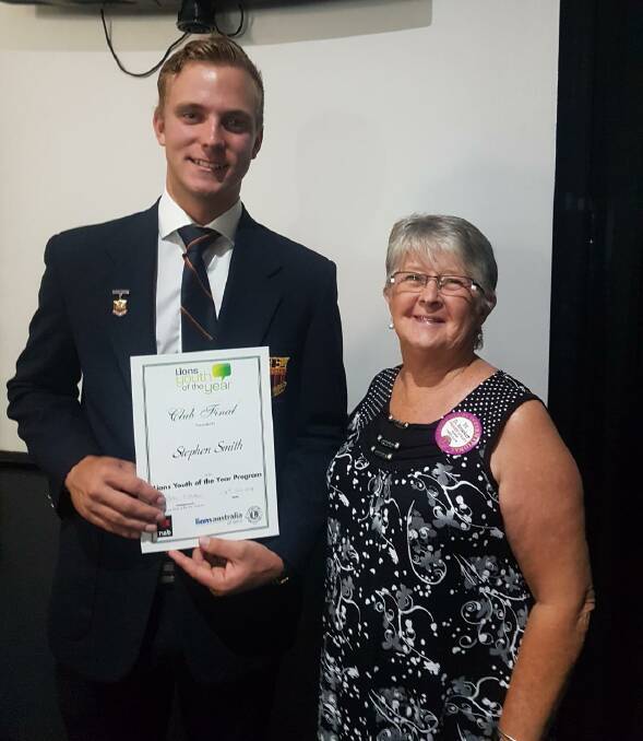 Lions Youth of the Year winner Stephen Smith from Wingham with Taree Lions Club president Di Brooker. Photo Phil Grissold.