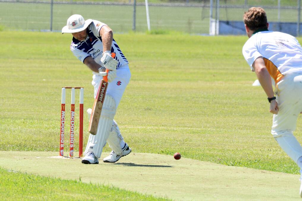 United batsman Murray McCartney plays defensively during last season's second grade grand final against Great Lakes. Great Lakes won the game.