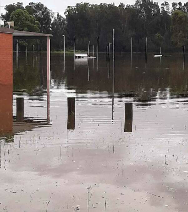Manning Valley Netball Association's complex courts and administration area under water in the devastating March floods.